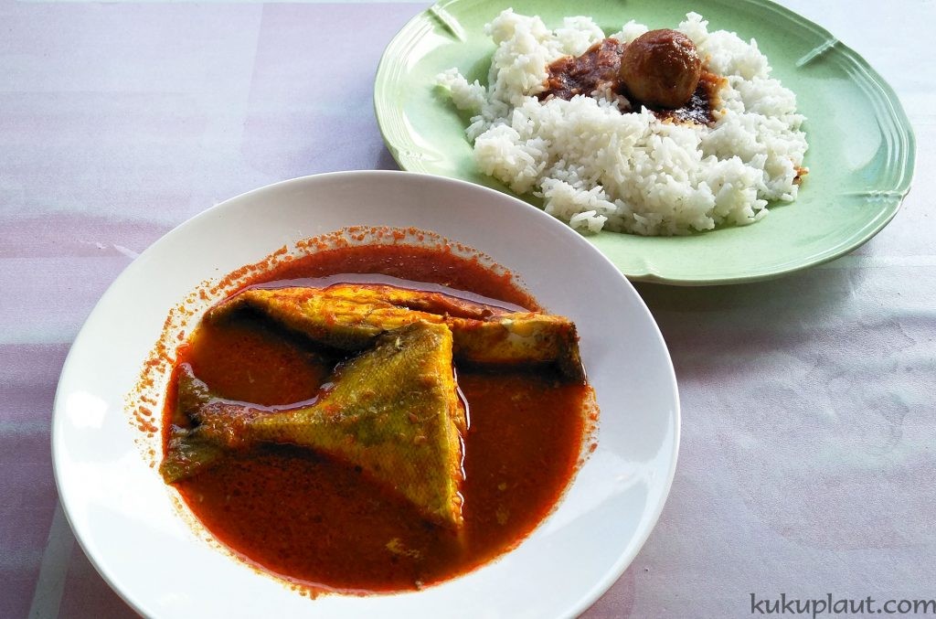 Appetizing Assam fish with rice
